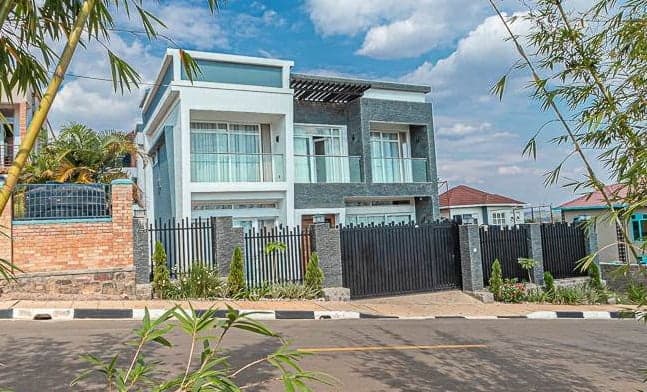 House with a beautiful garden showcasing real estate